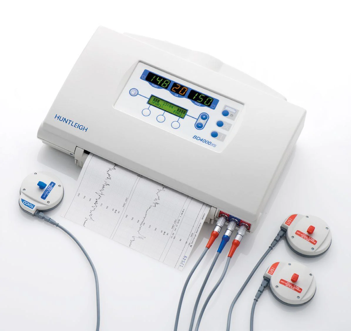 An overhead view of the Huntleigh Soncaid BD4000xs with the display on, twins FHR printout and transducers around the unit.
