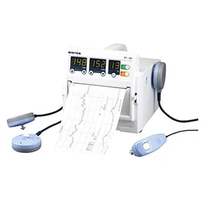A front angled view of the Bistos BT-300 Fetal Monitor with parameters displayed, a full page printout and transducers attached to the monitor.
