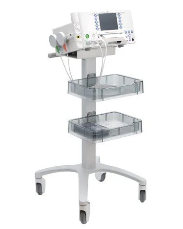 A front angled shot of the Huntleigh Sonicaid FM830 Encore Acute on rolling stand and transducers attached.